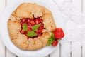 Strawberry galette. Homemade healthy wholegrain berry open pie. Fruit tart. Top view