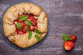 Strawberry galette. Homemade healthy wholegrain berry open pie. Fruit tart. Top view