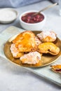 Strawberry heart pop tarts, shot from the top on a  concrete  background. Tasty toaster pastry Royalty Free Stock Photo