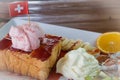 Strawberry honey Toast bread topped with ice cream, stawberry