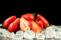 Strawberry on the ice on black background food postcard Royalty Free Stock Photo