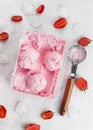 Strawberry ice cream in box on a white background Royalty Free Stock Photo