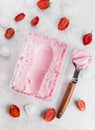 Strawberry ice cream in box on a white background Royalty Free Stock Photo