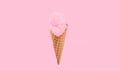 Strawberry ice cream cone on faded pastel color background.