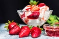 Strawberry ice cream with mint in bowl and jam Royalty Free Stock Photo