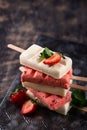 Strawberry ice cream pop sicle with mint Royalty Free Stock Photo