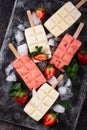 Strawberry ice cream pop sicle with mint Royalty Free Stock Photo