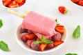 Strawberry ice cream popsicles