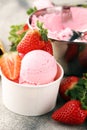 Strawberry ice cream scoop with fresh strawberries and waffle icecream cones Royalty Free Stock Photo