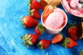 Strawberry ice cream scoop with fresh strawberries and waffle icecream cones Royalty Free Stock Photo