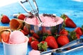 Strawberry ice cream scoop with fresh strawberries and waffle icecream cones Royalty Free Stock Photo