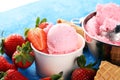 Strawberry ice cream scoop with fresh strawberries and waffle icecream cones Royalty Free Stock Photo