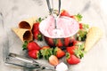 Strawberry ice cream scoop with fresh strawberries and waffle icecream cones Royalty Free Stock Photo