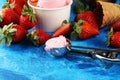 Strawberry ice cream scoop with fresh strawberries and waffle icecream cones Royalty Free Stock Photo