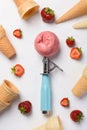 Strawberry ice cream scoop spoon with wafer cones and berries Royalty Free Stock Photo