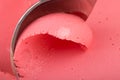 Strawberry Ice cream and spoon, close-up view