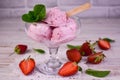 Strawberry ice cream and fresh strawberries on a white background. Royalty Free Stock Photo