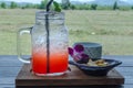 Strawberry italian soda with ice in cup