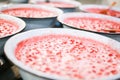 Strawberry jam cooking process. Organic traditional jam manufacturing