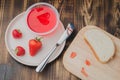 Strawberry jam. Bread and strawberry jam on a wooden table with jar of jam and fresh strawberry. Top view. Making sandwiches with Royalty Free Stock Photo