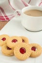 Strawberry jam sandwich biscuits with coffee cup Royalty Free Stock Photo