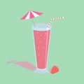 Strawberry juice blended in a glass with an umbrella and straw With strawberries on the side On a green background Royalty Free Stock Photo