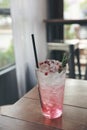 Strawberry juice cocktail with soda on wood background Royalty Free Stock Photo