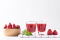 Close up of strawberry juice in glass with fresh strawberry fruit on white background, Summer drink Royalty Free Stock Photo