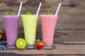 Strawberry kiwi and blueberry  smoothies colorful fruit juice milkshake. Royalty Free Stock Photo