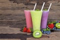 Strawberry kiwi and blueberry  smoothies colorful fruit juice milkshake. Royalty Free Stock Photo