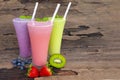 Strawberry kiwi and blueberry  smoothies colorful fruit juice milkshake. Royalty Free Stock Photo