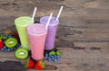 Strawberry kiwi and blueberry  smoothies colorful fruit juice milkshake. Royalty Free Stock Photo