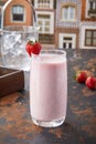 Strawberry Lassi served in glass isolated on table top view of punjabi culture Royalty Free Stock Photo