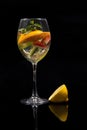 Cocktail mojito with orange, lemon, strawberry, cucumber and min Royalty Free Stock Photo