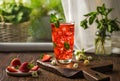 Strawberry lemonade with mint. Iced tea with strawberries. Summer refreshing cocktail with ice. Royalty Free Stock Photo