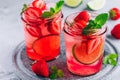 Strawberry lime lemonade with fresh mint and ice in glass jar Royalty Free Stock Photo