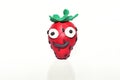 Strawberry made from plasticine. Royalty Free Stock Photo