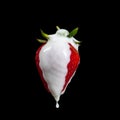 Strawberry Making A Splash. Isolated on black background. Royalty Free Stock Photo