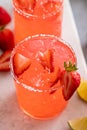 Strawberry margarita cocktail with lime and crushed ice Royalty Free Stock Photo