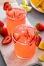 Strawberry margarita with lime, served with chips Royalty Free Stock Photo