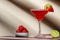 Strawberry Margarita summer alcoholic cocktail drink with silver tequila, lime juice, liqueur, strawberries and ice in glass with Royalty Free Stock Photo