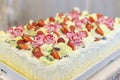 Strawberry meringue cake on a table on grey background. cake with fruits.Selective focus.cream and yogurt cake with Royalty Free Stock Photo