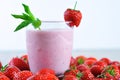 Strawberry milkshake closeup and white background Royalty Free Stock Photo