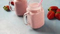 Strawberry milkshake in mason jars Royalty Free Stock Photo