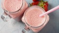 Strawberry milkshake in mason jars Royalty Free Stock Photo