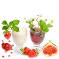 Strawberry milkshake or smoothie , fresh berries strawberries , pomegranate seeds and figs isolated on white Royalty Free Stock Photo