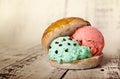 Strawberry and mint ice cream ball inside a milk bread roll