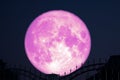 strawberry moon on night sky back silhouette stainless steel iron fence