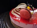 Sponge pieces on a table neatly arranged, served to visitorsStrawberry mousse cake served with topping strawberries, kiwi fruit an Royalty Free Stock Photo