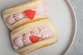 Strawberry pancakes on a white plate